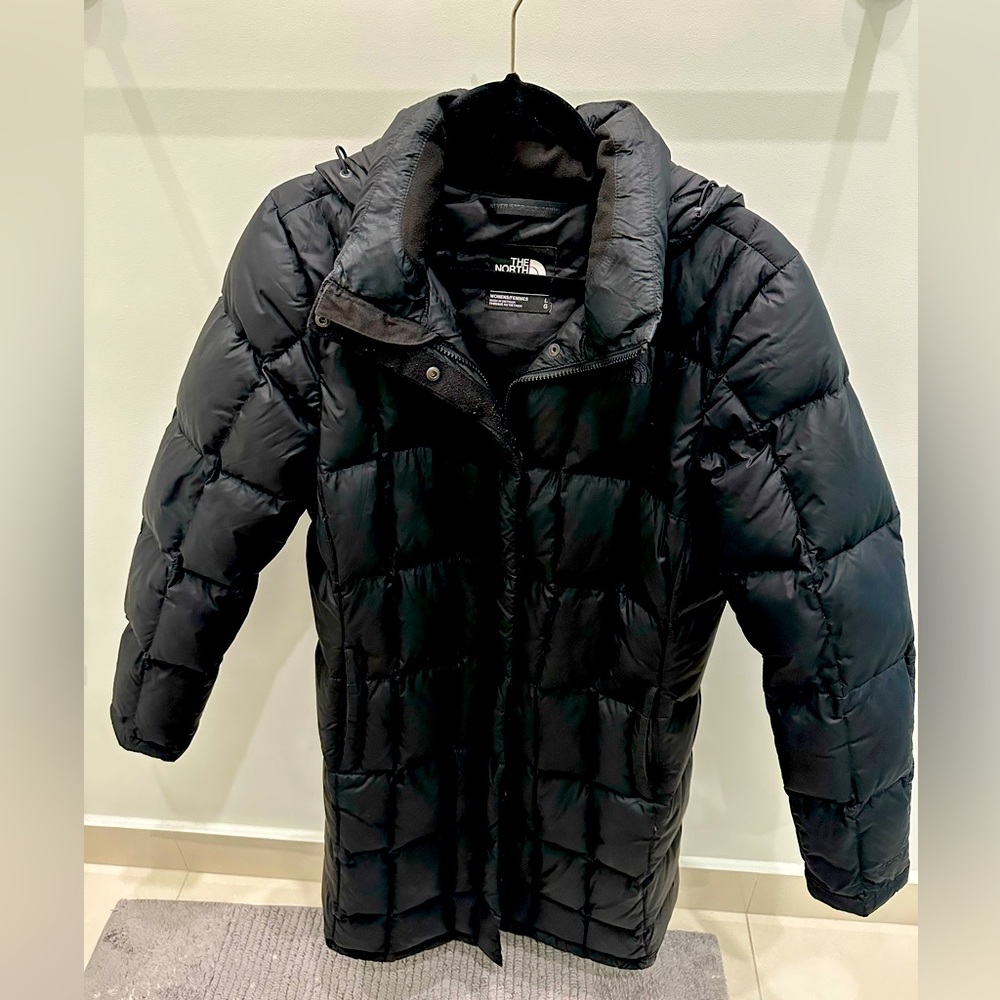 The North face long down filled coat with a hood and pockets